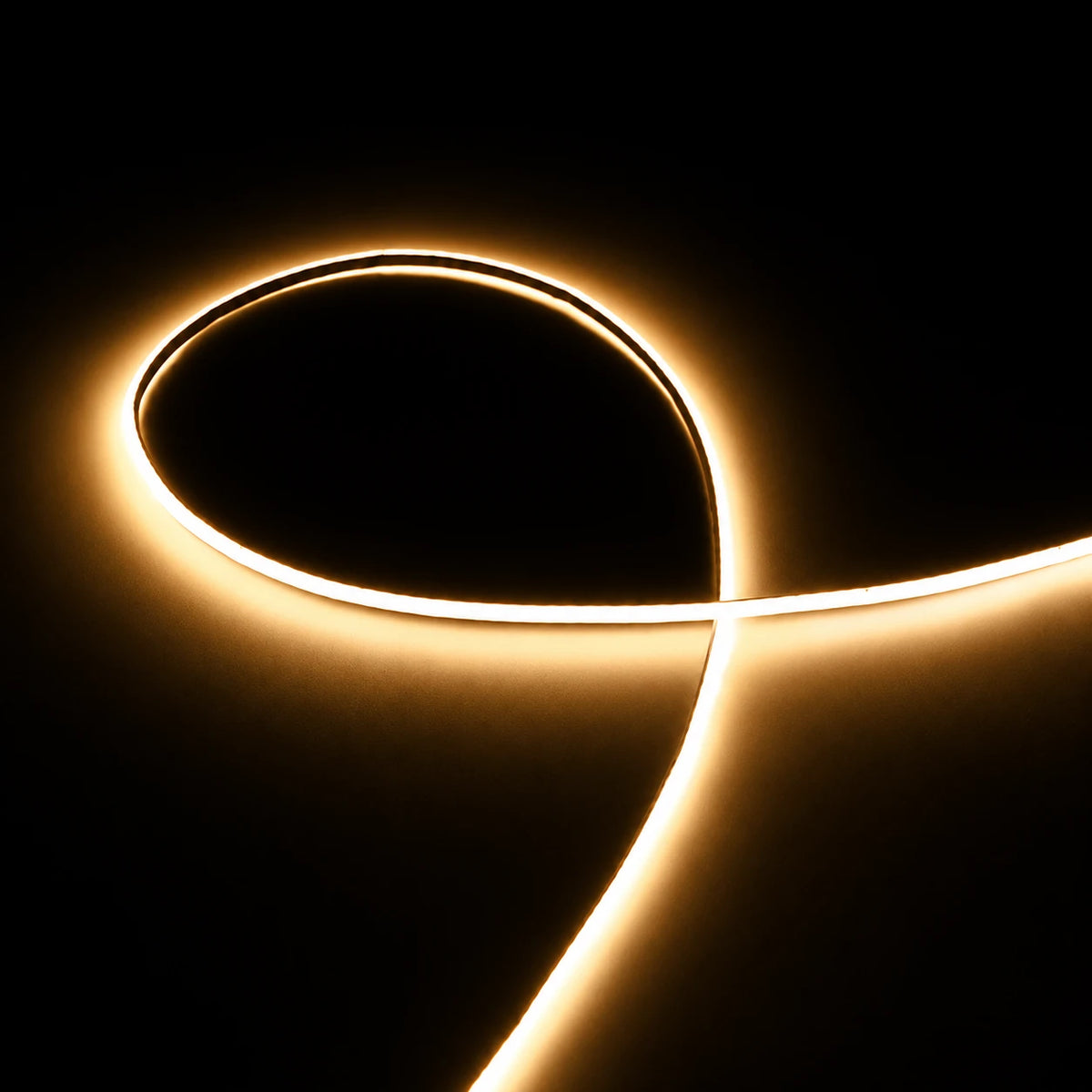 2mm COB LED strip lit in 3000K warm white with CRI 90 color rendering