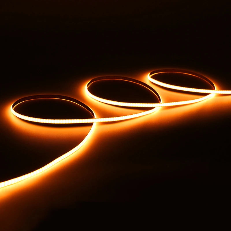 4mm COB LED strip lit in amber orange, 12V single color version
